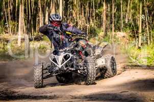 ATV racer takes a turn during a race.