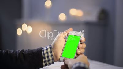 Using Smart Phone on Wood Table Various Hand Gestures Vertical Close up Green Screen