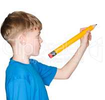 Kind mit einem Bleistift in der Hand