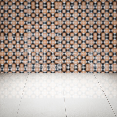 Wood table top and blur vintage ceramic tile pattern wall