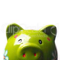 Close up of a green piggy bank