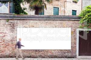 Billboard with copy space on the wall in Venice
