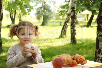 young girl drink milk