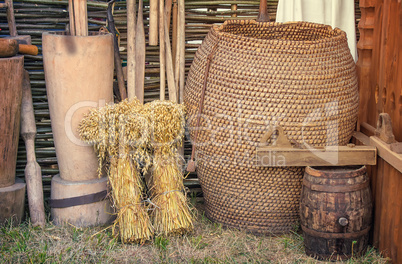 Two beams and ancient objects of rural life.