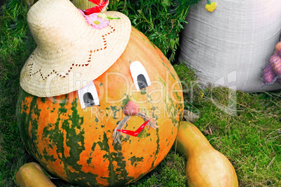 Large pumpkin originally executed as an amusing figurine.