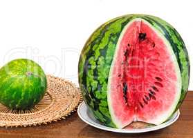 The ripe cut water-melon on a white background.