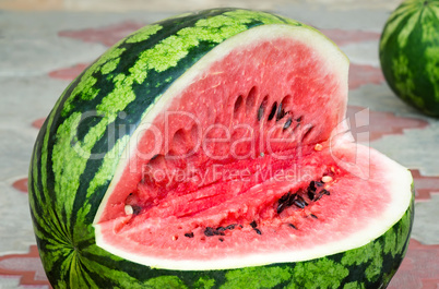 A ripe watermelon cut , photographed closeup