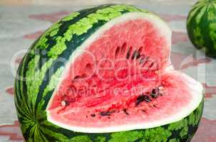 A ripe watermelon cut , photographed closeup