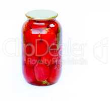 Canned tomatoes in a large glass jar on white background