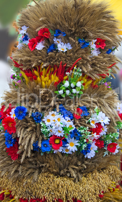 Beautiful ornament from stalks of grain cereals and flowers.