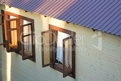 Detail of the facade of the house with Windows.