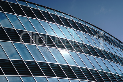 Reflection in windows of modern office building - part of modern