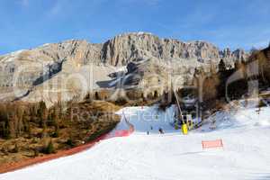 The ski slope and skiers at Passo Groste ski area, Madonna di Ca