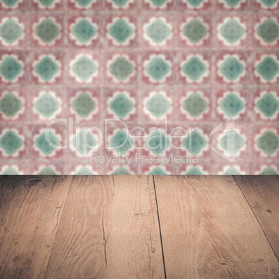 Wood table top and blur vintage ceramic tile pattern wall