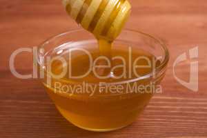 Wooden honey stick to extract honey