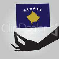 Hand with flag Kosovo