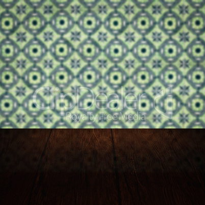 Wood table top and blur vintage ceramic tile pattern wall