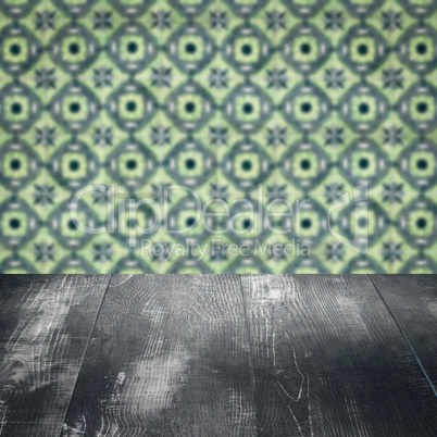 Wood table top and blur vintage ceramic tile pattern wall
