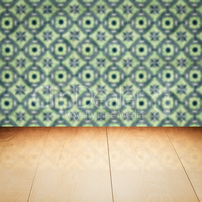 Wood table top and blur vintage ceramic tile pattern wall