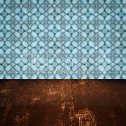 Wood table top and blur vintage ceramic tile pattern wall