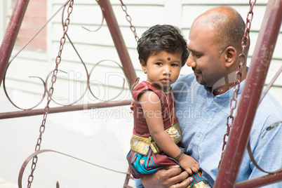 Indian father and daughter outdoor portrait