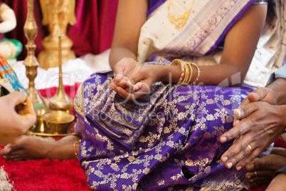 Woman received prayers from priest.