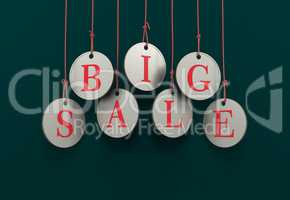 Dangling coins with the word big sale