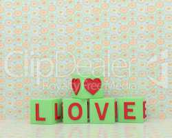 Green-light green cubes with the word love