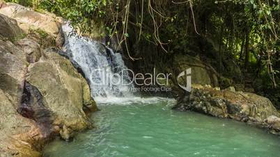 Tropical waterfall with mini lake loop