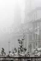 Neptune fountain in the fog