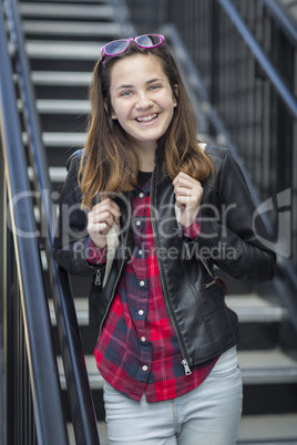 Portrait of Pretty Young Female Student With Backpack