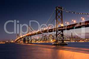 Sunset over Bay Bridge and San Francisco Skyline, California
