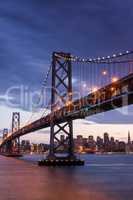 Sunset over Bay Bridge and San Francisco Skyline, California
