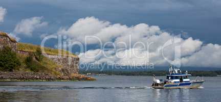 Boat leaves Suomenlina Sea Fortress, Helsinki, Finland