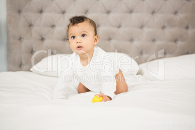 Cute baby playing with ball