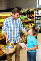 Father and son doing shopping