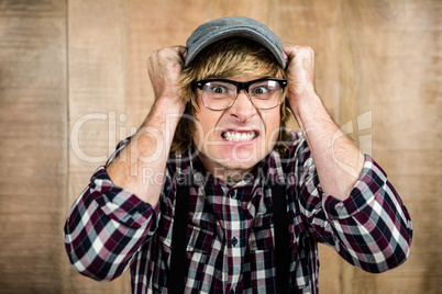 Blond hipster staring at camera