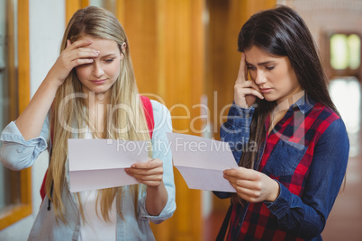 Anxious students looking at results