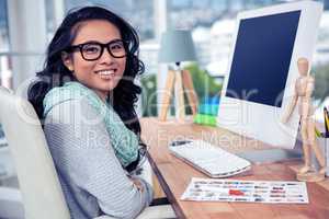 Asian businesswoman sitting in office