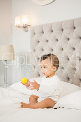 Cute baby playing with ball