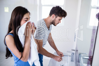 Young couple in bathroom