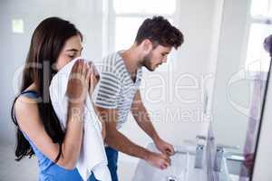 Young couple in bathroom