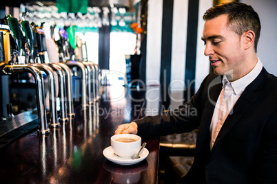 Businessman having a coffee