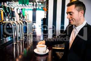 Businessman having a coffee