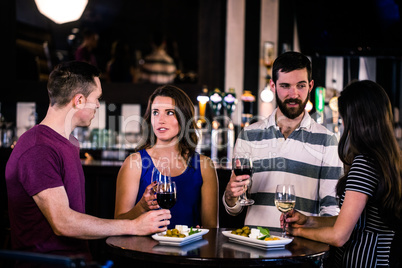 Friends having a glass of wine