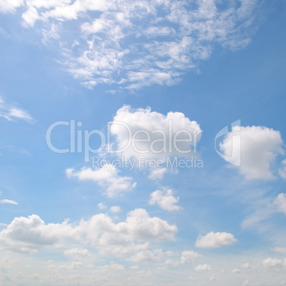 cumulus clouds in the blue sky