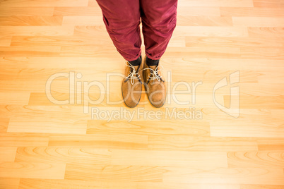 Above view of a man with yellow shoes