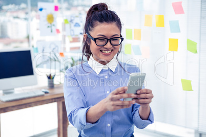 Asian businesswoman using smartphone