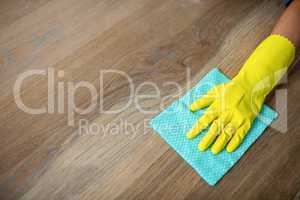 Woman cleaning up the table