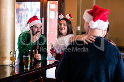 Festive friends in a bar